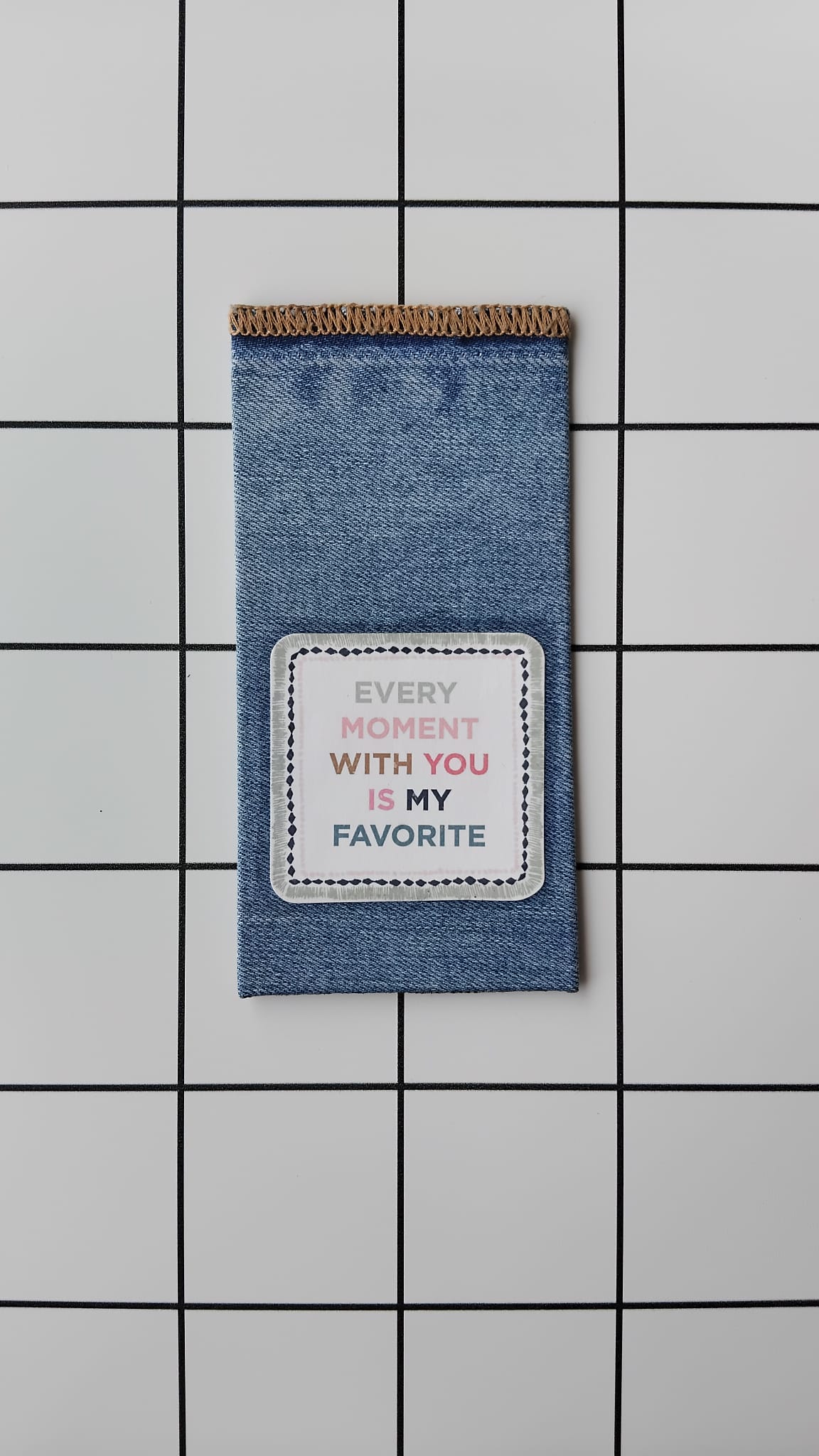 Purchase Every Moment Denim fabric wrapped bookmark.