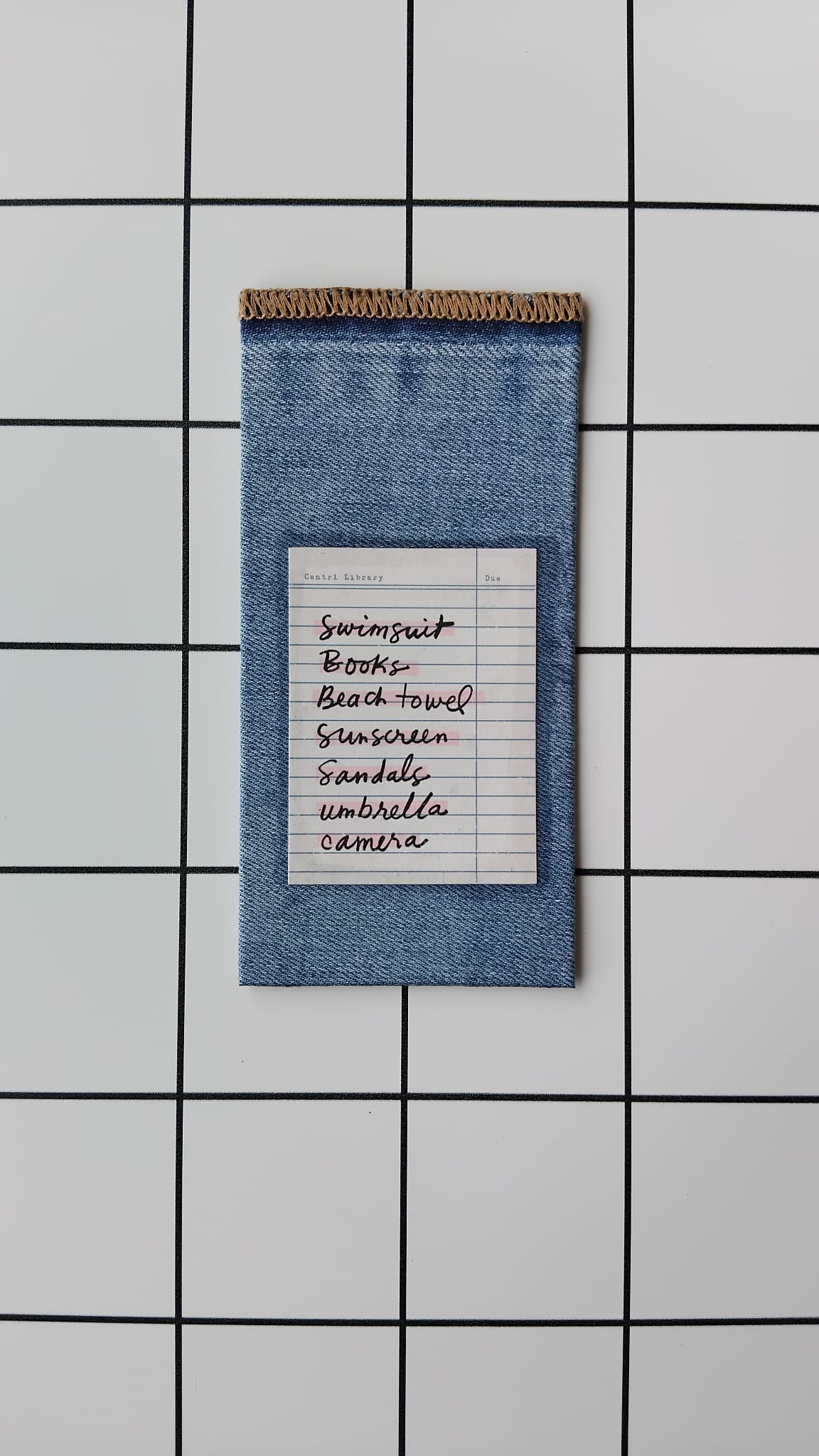 Purchase Holiday List Denim fabric wrapped bookmark.