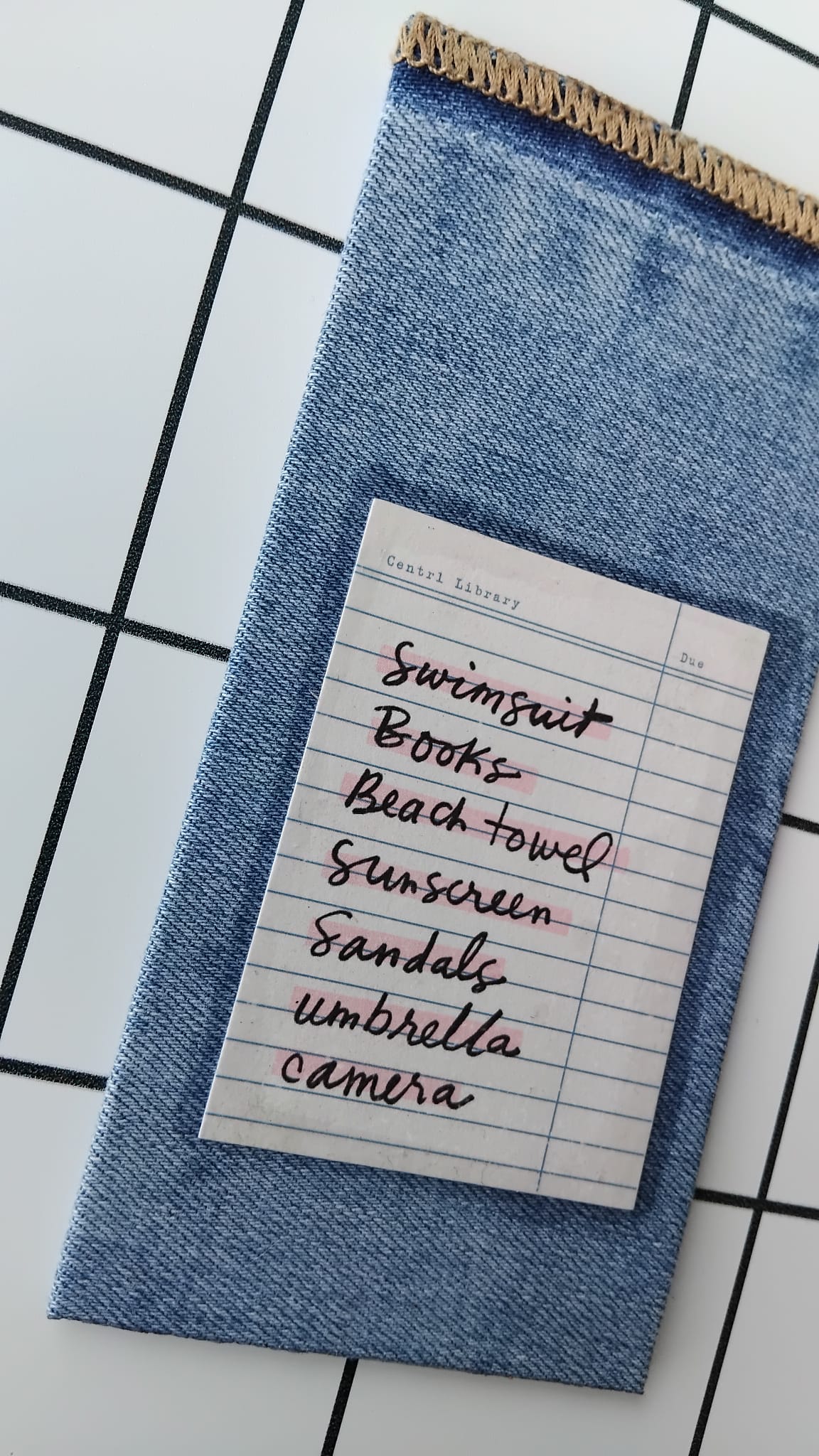 Purchase Holiday List Denim fabric wrapped bookmark.