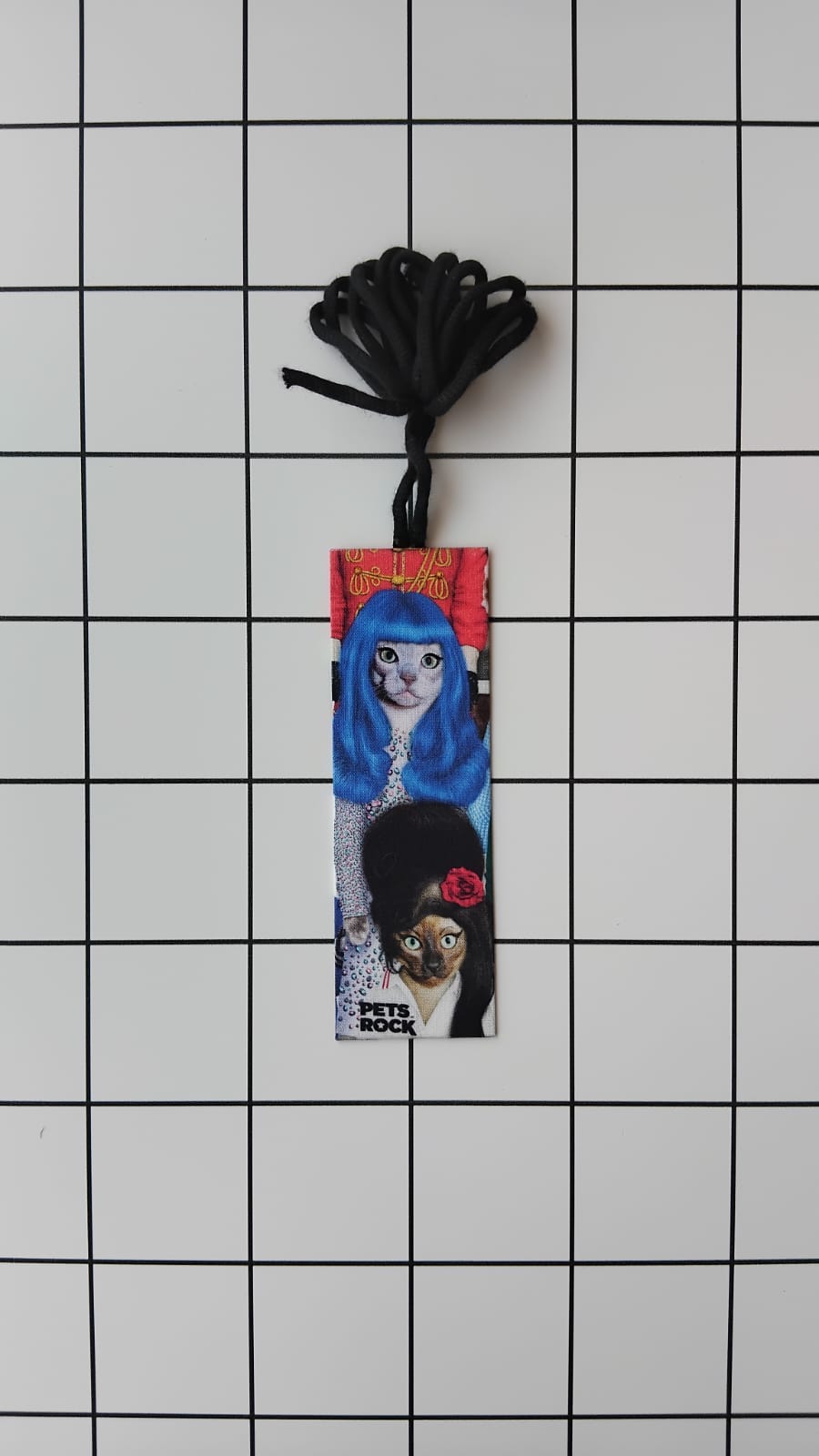 Buy Alexander Henry Pet Rock Stars fabric wrapped bookmark.