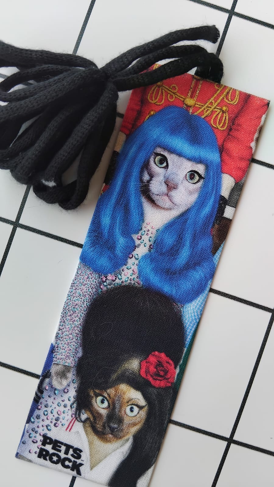 Buy Alexander Henry Pet Rock Stars fabric wrapped bookmark.
