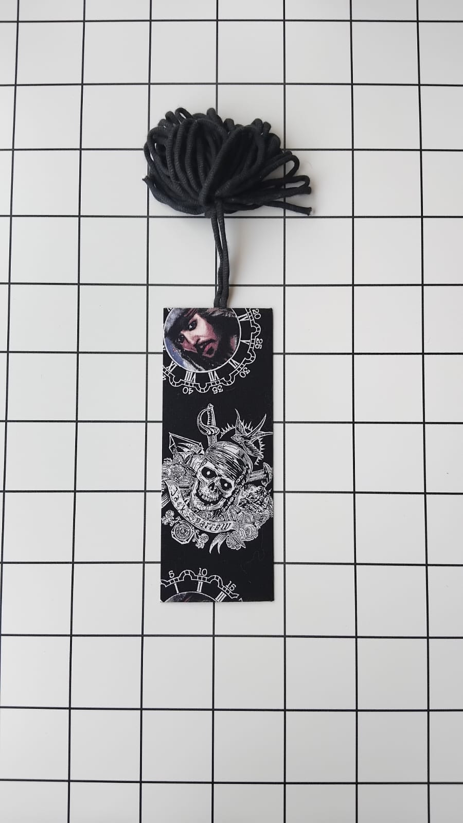 Buy Pirates of the Caribbean fabric wrapped bookmark.